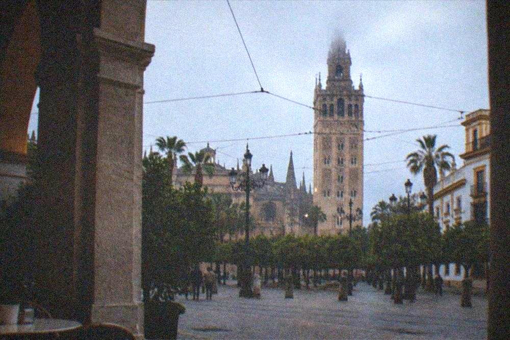 The Giralda tower viewed from a square in central Seville