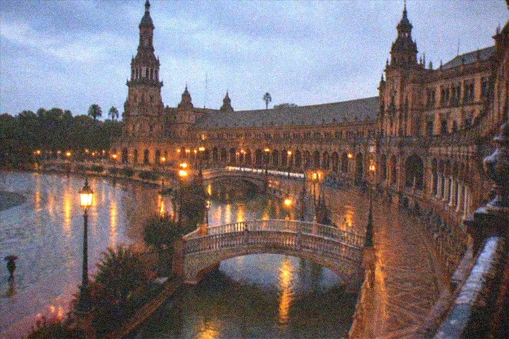 The semicircular building and canal of Plaza de España in Seville