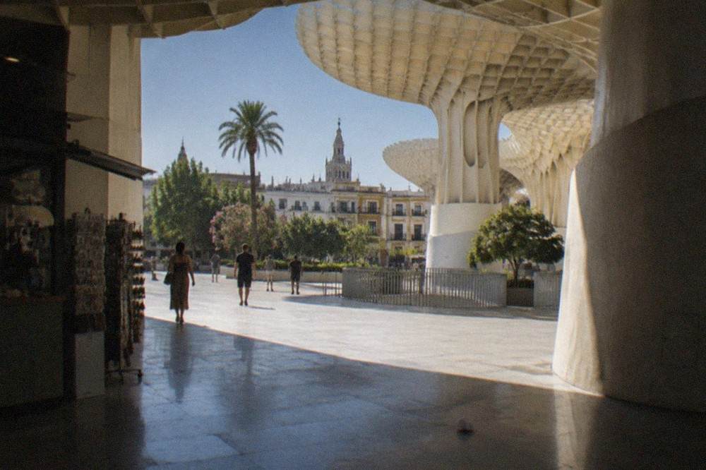 The Metropol Parasol structure rising above a plaza in Seville